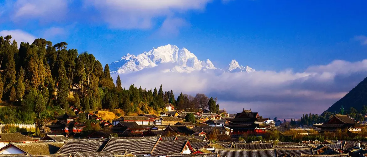 Lijiang old town. You can see Jade Dragon Snow Mountain in the distance.