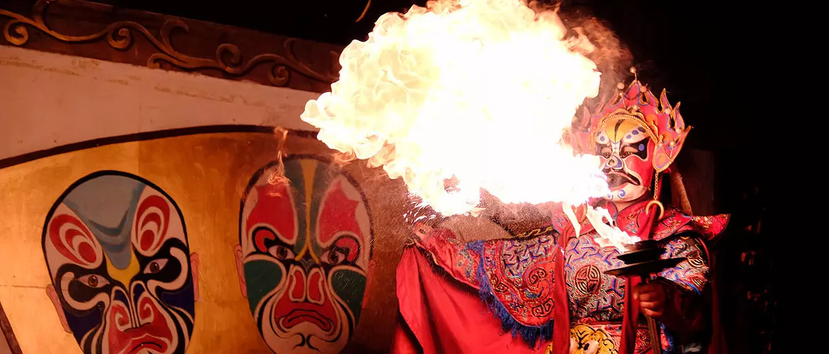 Changing face and flaming are unique acrobatics in Sichuan opera