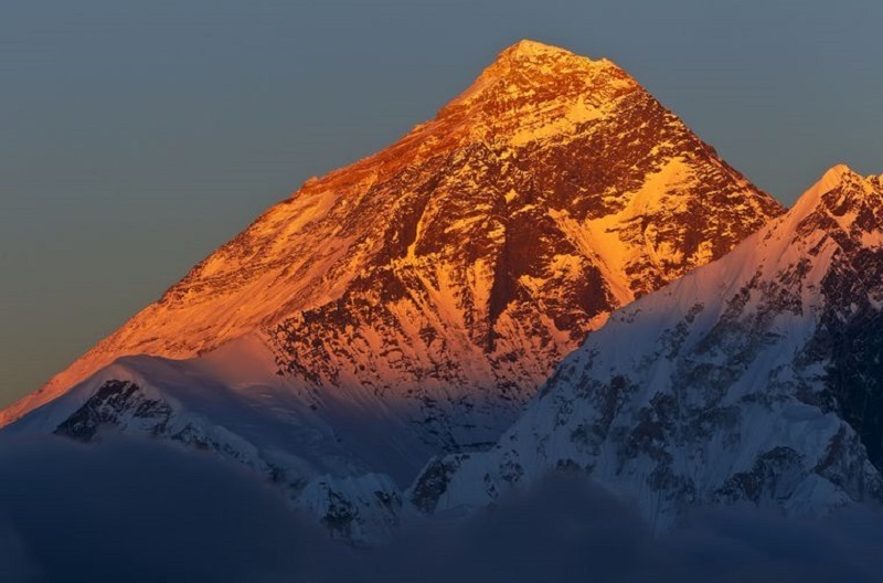 You are likely to see the golden submmit of Mt. Everest in April and May.