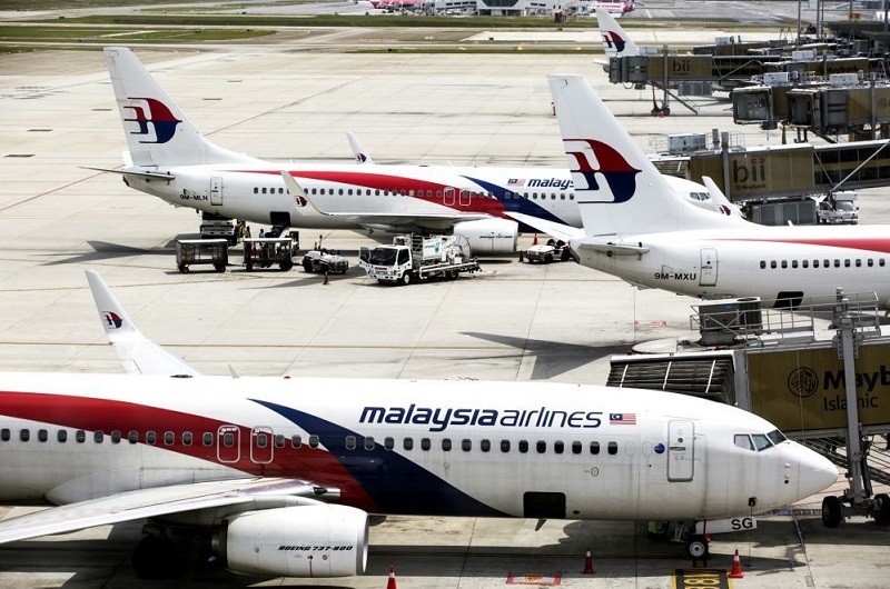 Planes belong to Malaysia Airlines.