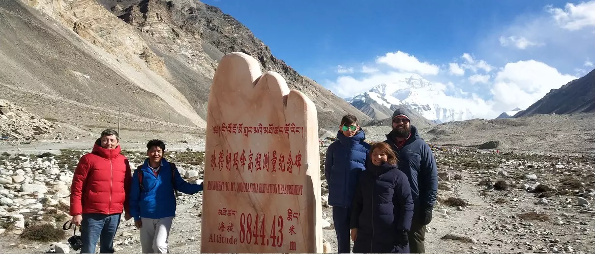 Tourists at the monument of Everest Base Camp.