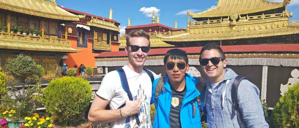 Our tourists and tour guide at Jokhang Temple in Lhasa.