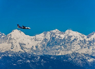 The plane flies over the Himalayas