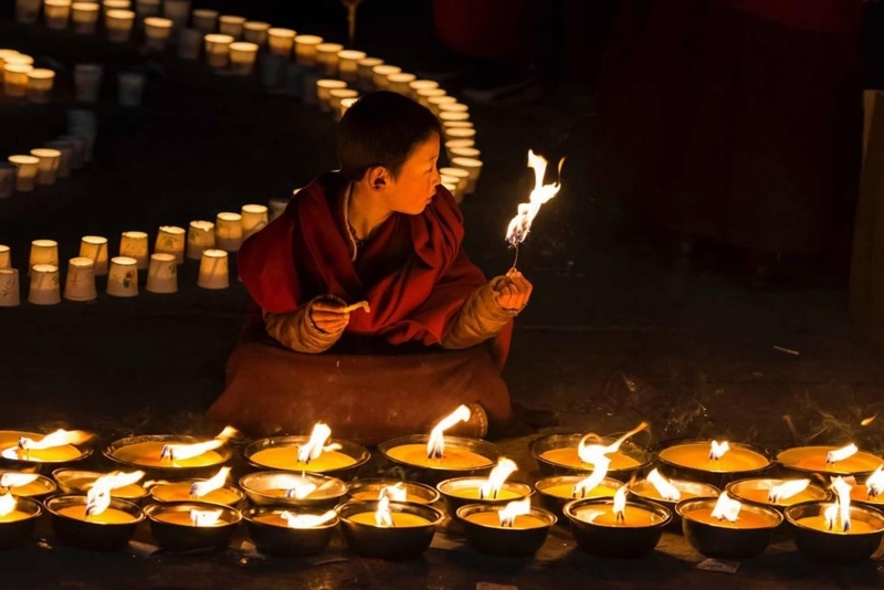 A little monk in Butter Lamp Festival Butter lamp festival is more of a party at night.